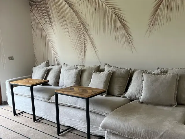 Salita con mueble de muro a muro · Living